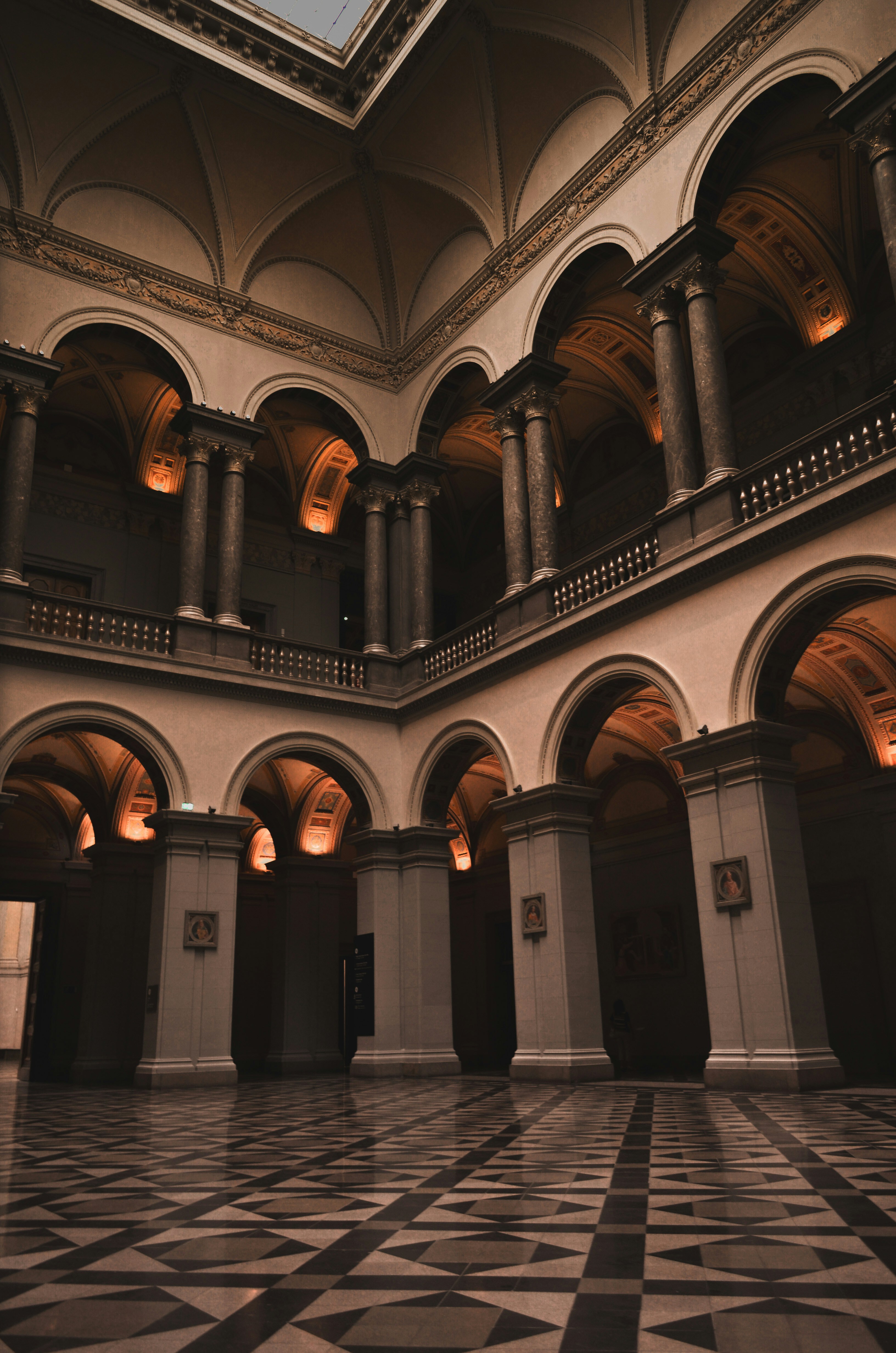 Golden lit interior with ancient columns
